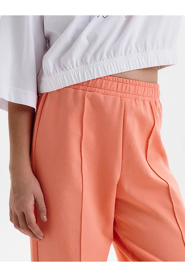 Брюки для девочек PELICAN, персиковый - фото 2